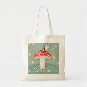 Tiny fairy perched on top of mushroom and glowing  tote bag