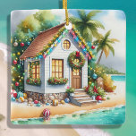 Tiny Home on the Beach Festive Christmas Ceramic Ornament<br><div class="desc">Personalised Christmas ornaement. Cute little white festive tiny house on a beach with pretty festive Christmas decorations like wreaths,  garland and Christmas lights on palm trees.</div>