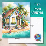 Tiny Home on the Beach Festive Christmas Holiday Postcard<br><div class="desc">Personalised Christmas postcard. Cute little white festive tiny house on a beach with pretty festive Christmas decorations like wreaths,  garland and Christmas lights on palm trees. On the back of the card you can add your own custom holiday message.</div>