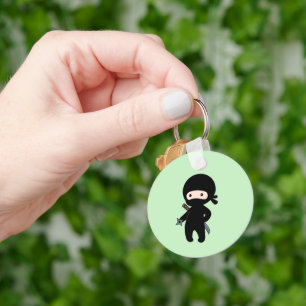 Tiny Ninja Holding Throwing Star on Green Key Ring