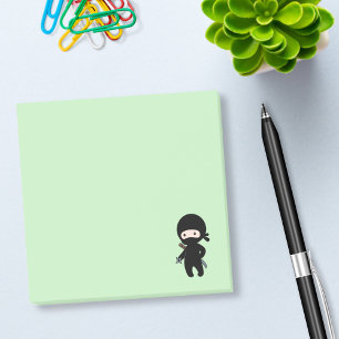Tiny Ninja Holding Throwing Star on Green Post-it Notes