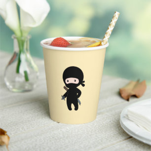 Tiny Ninja Holding Throwing Star on Yellow Paper Cups