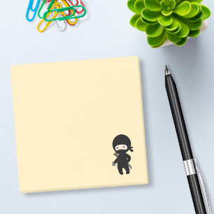 Tiny Ninja Holding Throwing Star on Yellow Post-it Notes