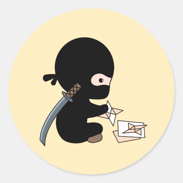 Tiny Ninja Making Origami Paper Throwing Star Classic Round Sticker (Front)