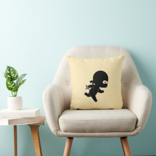Tiny Ninja Running On Yellow Cushion