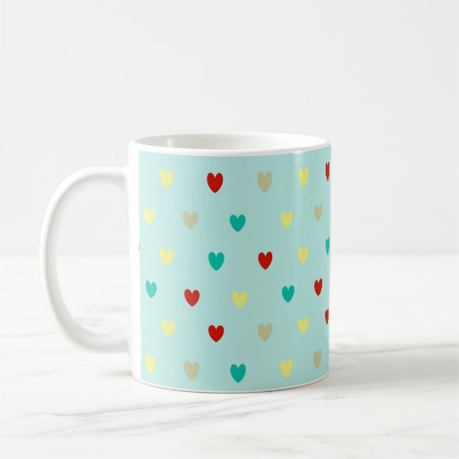 Tiny polka hearts on seafoam green coffee mug (Left)