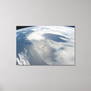Tiny Satellites Orbit Above A Part Of Earth. Canvas Print