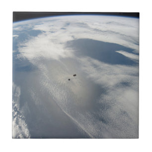 Tiny Satellites Orbit Above A Part Of Earth. Ceramic Tile