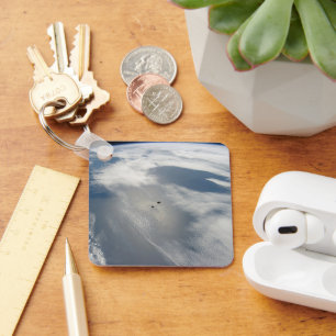 Tiny Satellites Orbit Above A Part Of Earth. Key Ring