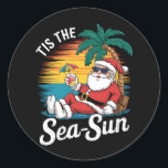 Tis The Sea Sun Santa Beach Christmas In Juy  Classic Round Sticker<br><div class="desc">Tis The Sea Sun Santa Beach Summer Christmas In July Summer</div>