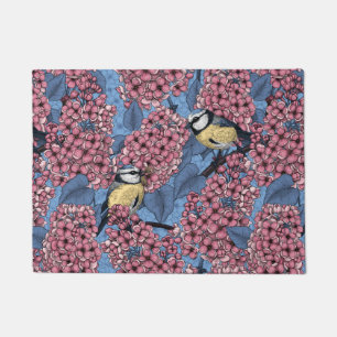 Tit birds in the lilac garden doormat