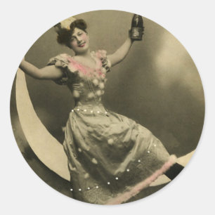Toast of Champagne on a Crescent Moon Classic Round Sticker