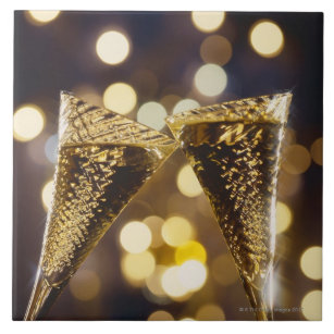 Toasted champagne flute, close-up tile