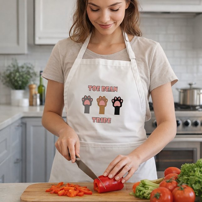 Toe Bean Tribe Cat Paws Brown Black Grey Standard Apron (An apron with three cat paws in gray, brown & black with the words toe bean tribe in pink and gray.)