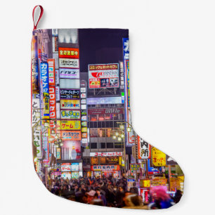TOKYO, JAPAN - MARCH 14, 2014: Signs densely line Small Christmas Stocking