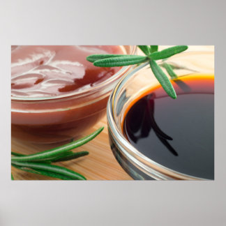 Tomato ketchup and soy sauce in a transparent bowl poster