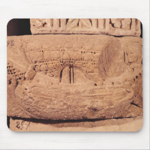 Tombstone depicting a fishing boat mouse pad