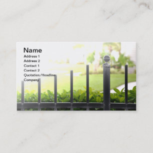 top of an outdoor black iron fence business card