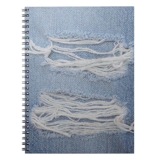 Torn denim: blue jeans texture. notebook (Front)