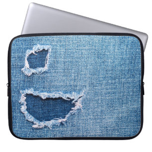 Torn denim fabric texture, blue hues. laptop sleeve