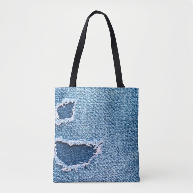 Torn denim fabric texture, blue hues. tote bag (Front)