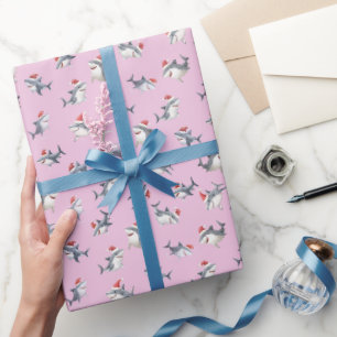 Tossed Christmas Sharks on Little Pink Wrapping Paper