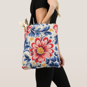 Tote bag with vibrant floral design featuring red