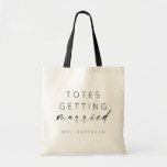 Totes Getting Married Tote Bag | Modern Script<br><div class="desc">This simple tote bag makes a fun gift for your favourite bride! Featuring minimal yet elegant design with a handwritten signature script and a simple sans-serif font. Personalise each bag with the bride's new name (or whatever custom text you'd like), and make additional edits by selecting "Click to customise further."...</div>