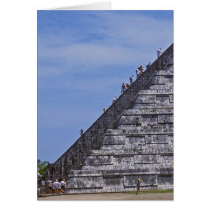 Tourists climbing stairs on ruins of El