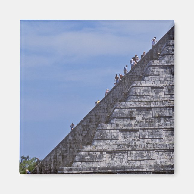 Tourists climbing stairs on ruins of El Magnet (Front)
