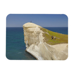 Tourists on cliff top at Tunnel Beach Magnet