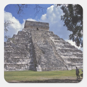 Tourists walk past an unrestored side of El 2 Square Sticker