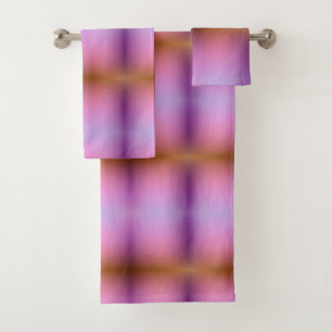 Towels on a rod with a vibrant gradient design
