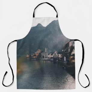 TOWN BESIDE BODY OF WATER AND MOUNTAINS APRON