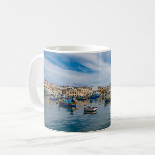 Traditional colorful fishing boats in the harbor coffee mug