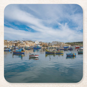 Traditional colorful fishing boats in the harbor square paper coaster