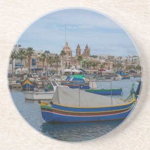 Traditional colourful fishing boats in Malta Coaster