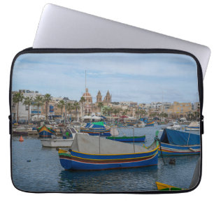 Traditional colourful fishing boats in Malta Laptop Sleeve