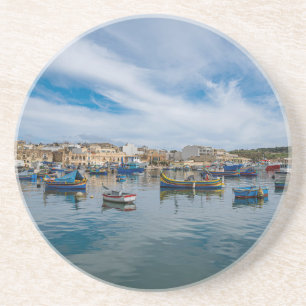 Traditional colourful fishing boats in the harbour coaster