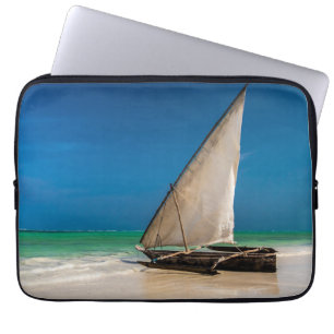 Traditional fishing boat on the beach laptop sleeve