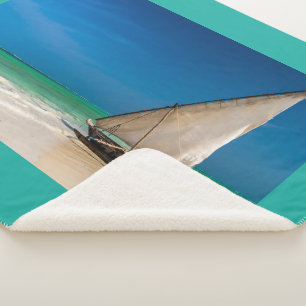 Traditional fishing boat on the beach sherpa blanket