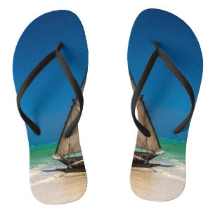 Traditional fishing boat on the beach thongs