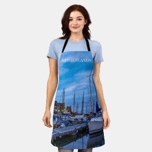 Traditional fishing town night scene apron