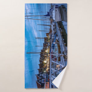 Traditional fishing town night scene bath towel