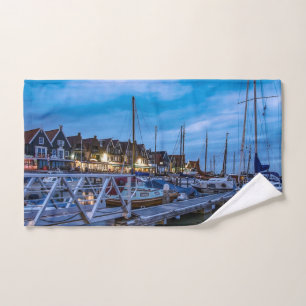 Traditional fishing town night scene hand towel