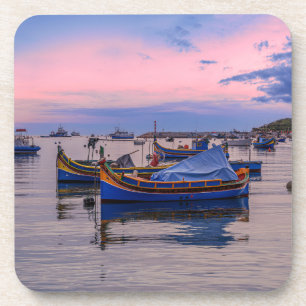 Traditional Maltese boats in Marsaxlokk Coaster