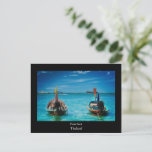 Traditional Thai Boats Post Card<br><div class="desc">This Photograph of two traditional Thai boats were captured on a summers day on a Phuket Beach in Thailand.
This post card is a perfect gift for friends family or anyone who love collecting photographs of the world.</div>