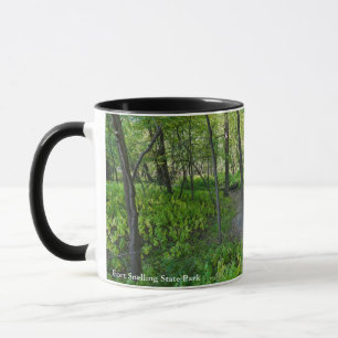 trail through fort snelling state park forest mug