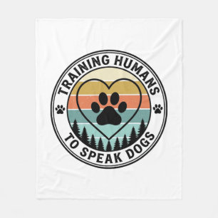 Training Humans to Speak Dogs Vintage Paw Badge_1 Fleece Blanket