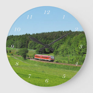 Tramcar with meadow field large clock